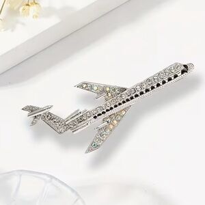Elegant Silver Airplane Brooch